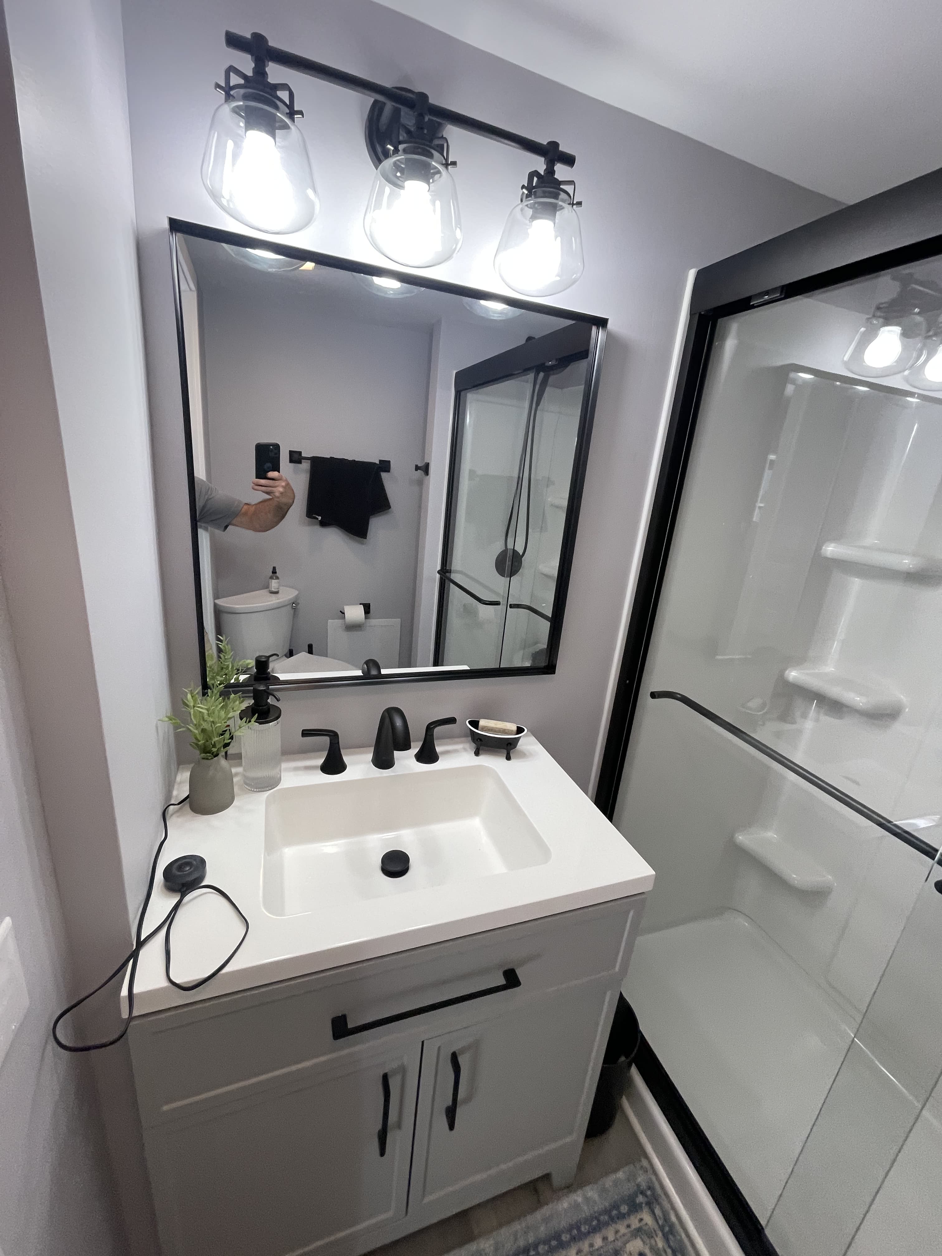 Bathroom renovation with updated vanity and finishes.
