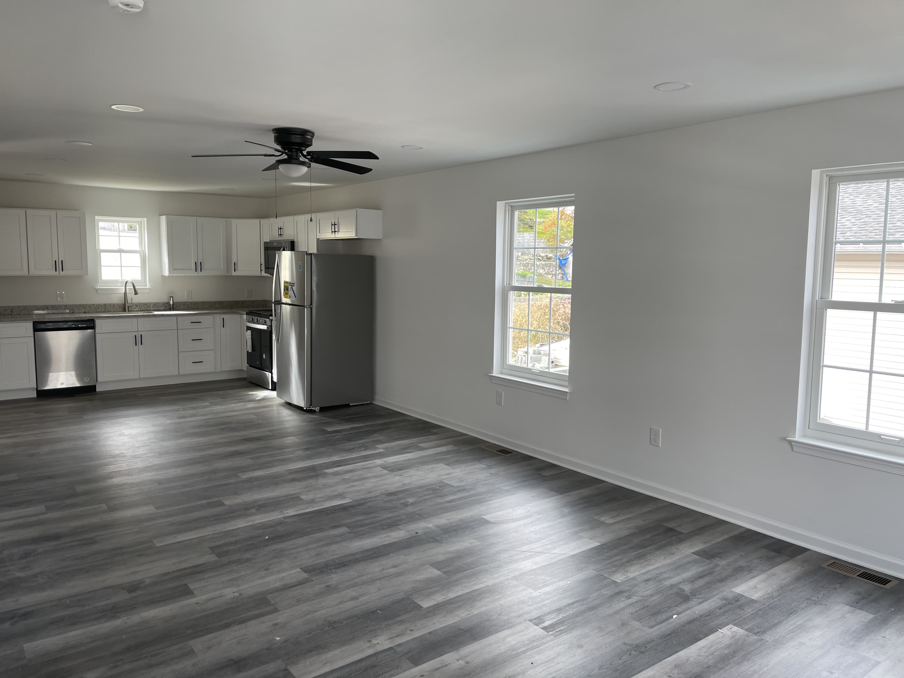 Kitchen remodel with updated finishes and fixtures.