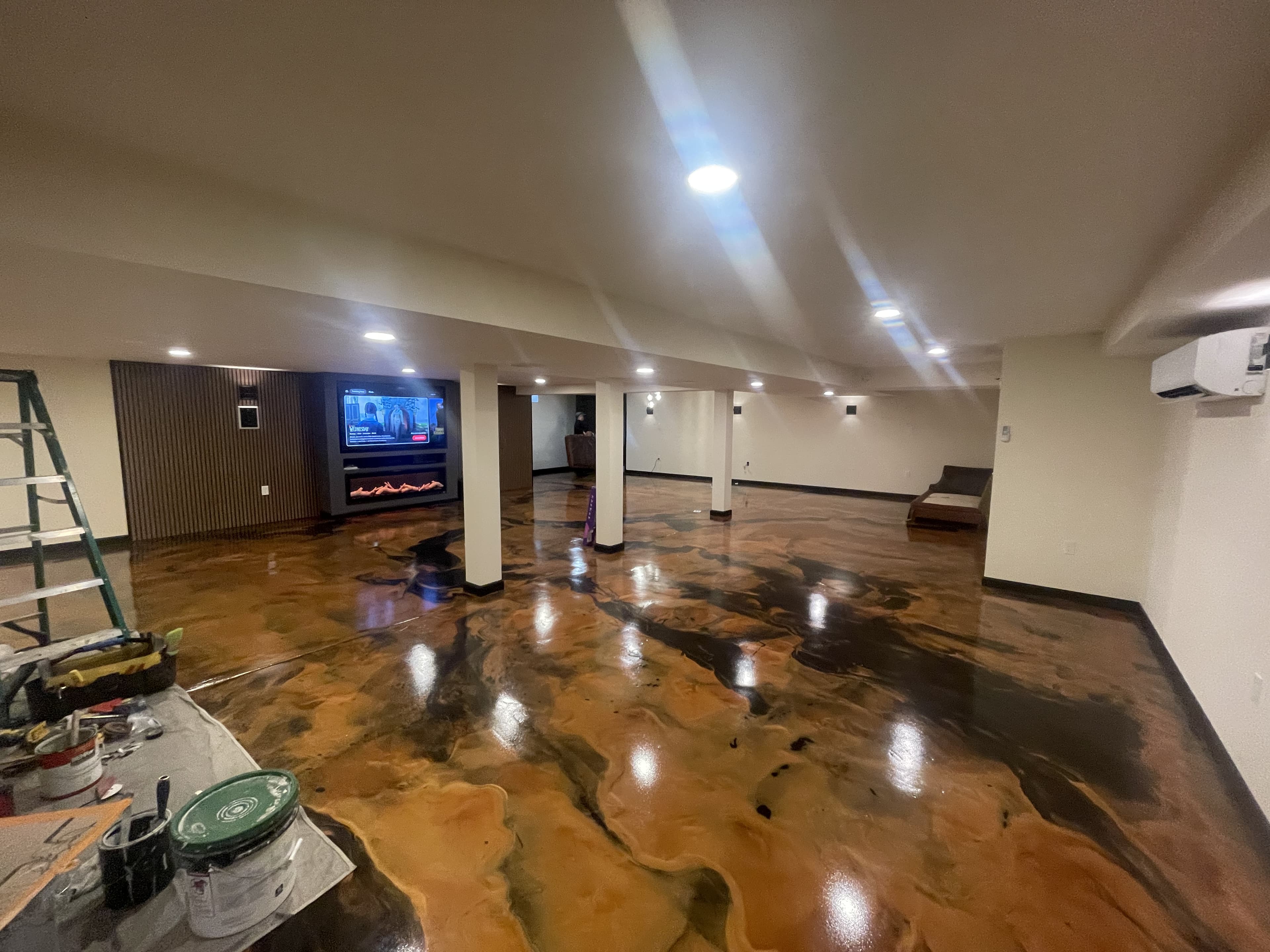 Basement wide-angle finish showing completed room flow.